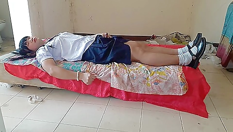 Cute asian lady wearing a uniform gets naked outdoors